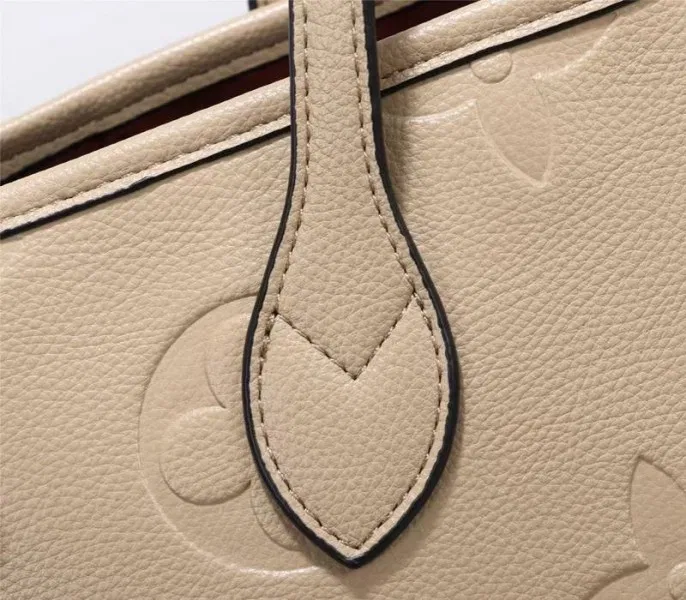 Louis Vuitton Monogram Empreinte Neverfull MM Tote In Beige — image 8