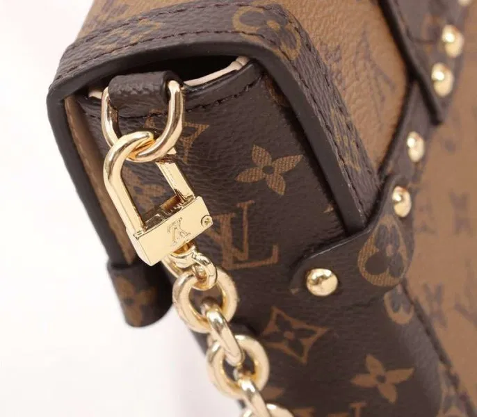 Louis Vuitton Monogram Reverse Canvas Vertical Trunk Pochette — image 8