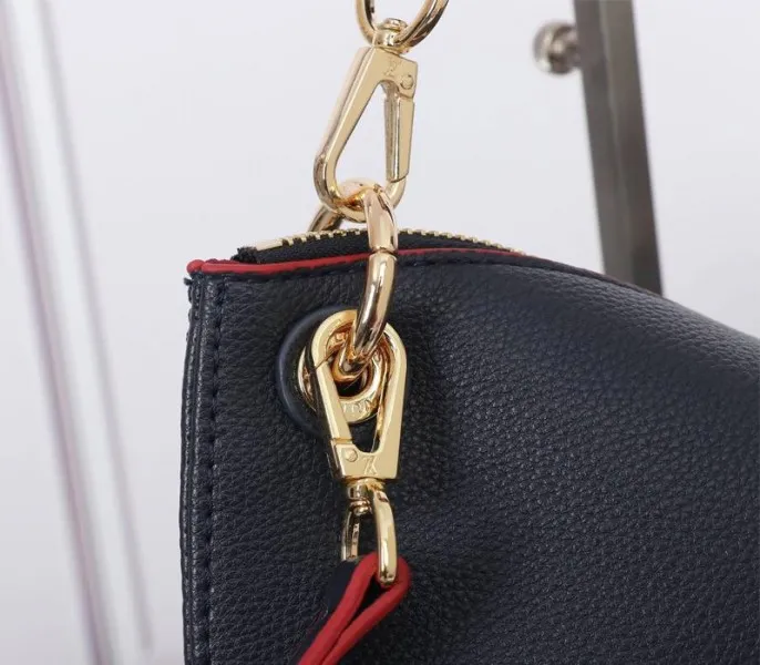 Louis Vuitton Monogram Empreinte Leather Maida Hobo In Navy Blue — image 9