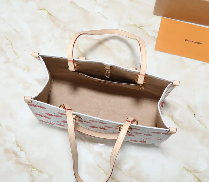 X TM Monogram Cherry Canvas Onthego MM In White Style 1 — image 3