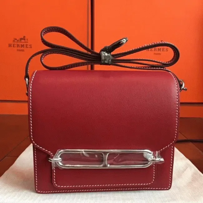 Red designer Hermes Mini Sac Roulis handbag