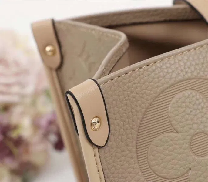 Louis Vuitton Monogram Empreinte Giant Onthego GM Tote In Beige — image 8