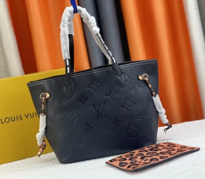 Louis Vuitton Monogram Empreinte Wild At Heart Neverfull MM Tote In Black
