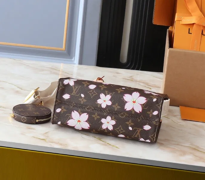 X TM Monogram Canvas Onthego PM With Cherry Blossom — image 4