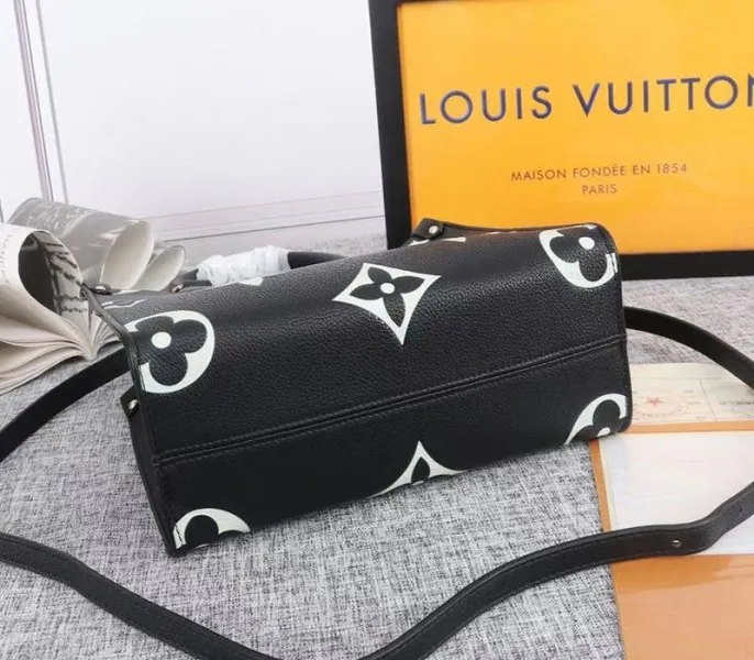 Louis Vuitton Bicolor Monogram Empreinte Leather Onthego PM Bag In Black And Beige — image 4