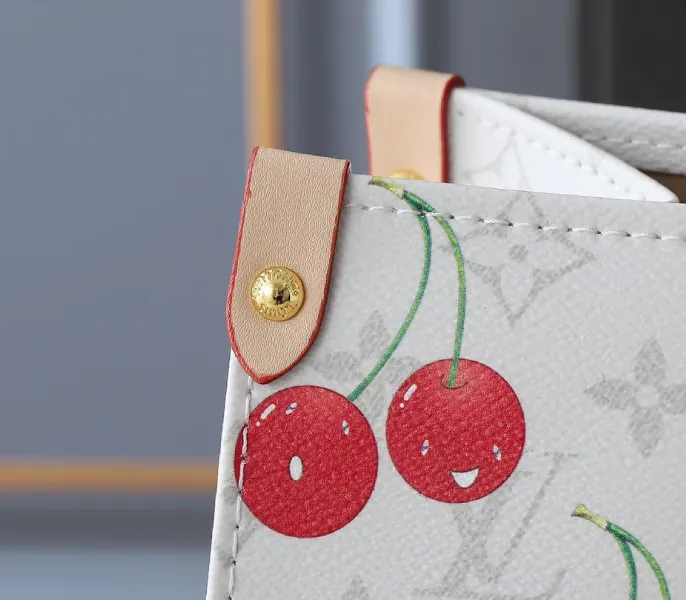 X TM Monogram Cherry Canvas Onthego MM In White Style 1 — image 8