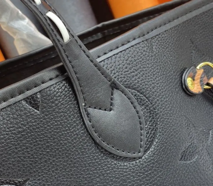 Louis Vuitton Monogram Empreinte Wild At Heart Neverfull MM Tote In Black — image 8