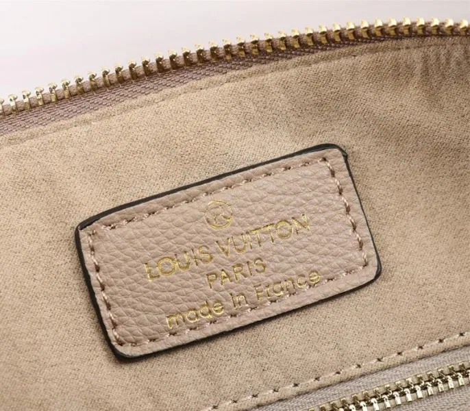 Louis Vuitton Bicolor Monogram Empreinte Leather Speedy Bandouliere 25 Handbag In Tourterelle Gray And Cream — image 6