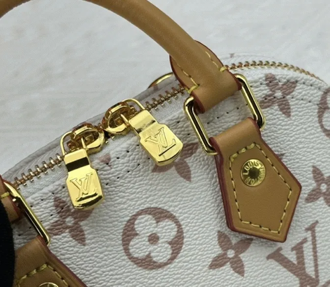 Louis Vuitton Monogram Dune Canvas Nano Alma Bag — image 2
