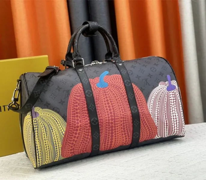 Louis Vuitton X YK Monogram Eclipse Reverse Keepall 45 Luggage In Pumpkin — image 5