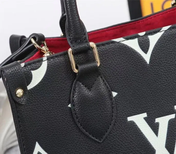 Louis Vuitton Bicolor Monogram Empreinte Leather Onthego PM Bag In Black And Beige — image 8