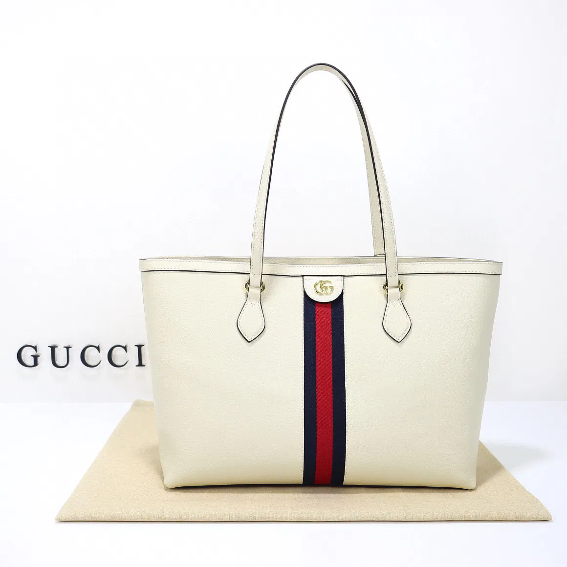 Ophidia medium leather tote in white